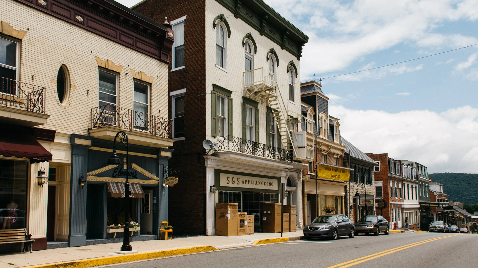 Main street in Bedford, Pennsylvania, lined with old brick and painted buildings