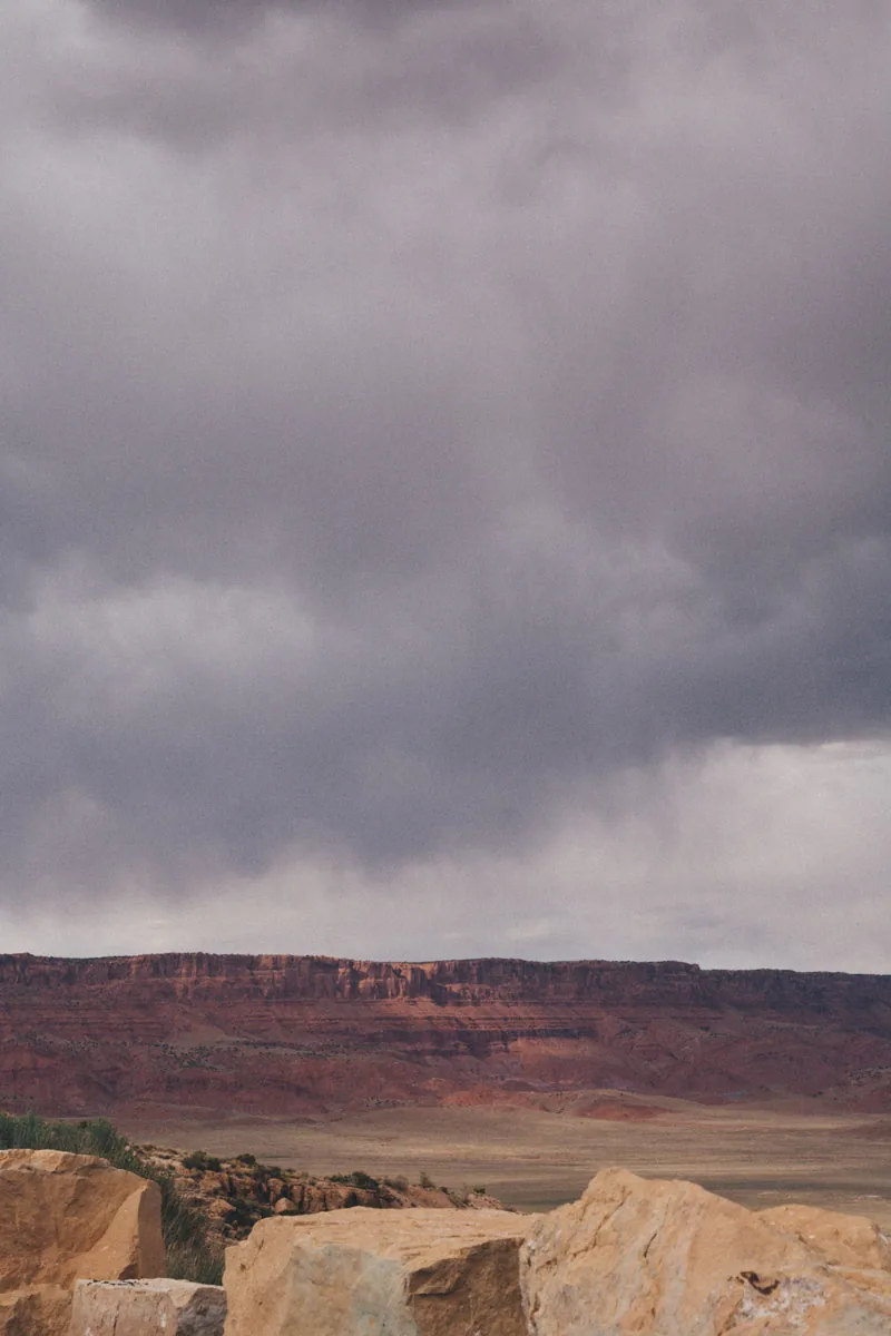 Storm clouds over the plain and the cliffs