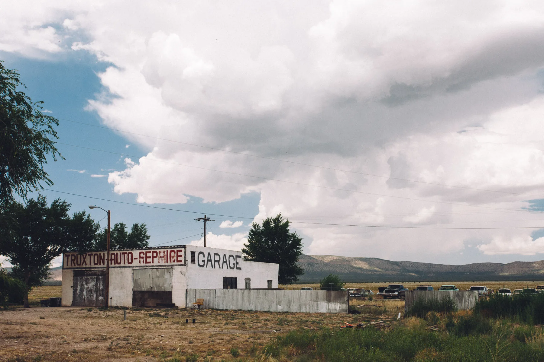 An abandoned auto repair garage by the road in Truxton