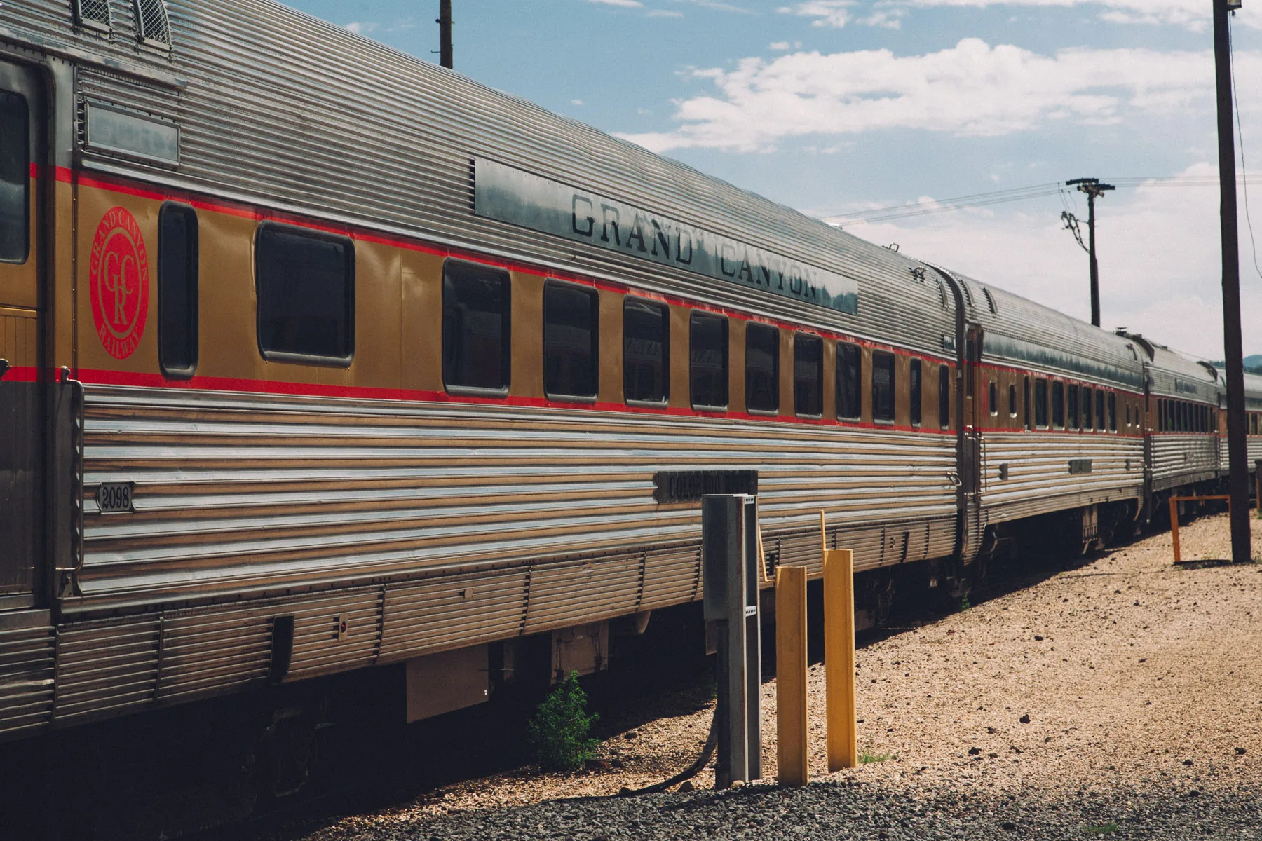 Silver Grand Canyon passenger cars at the depot