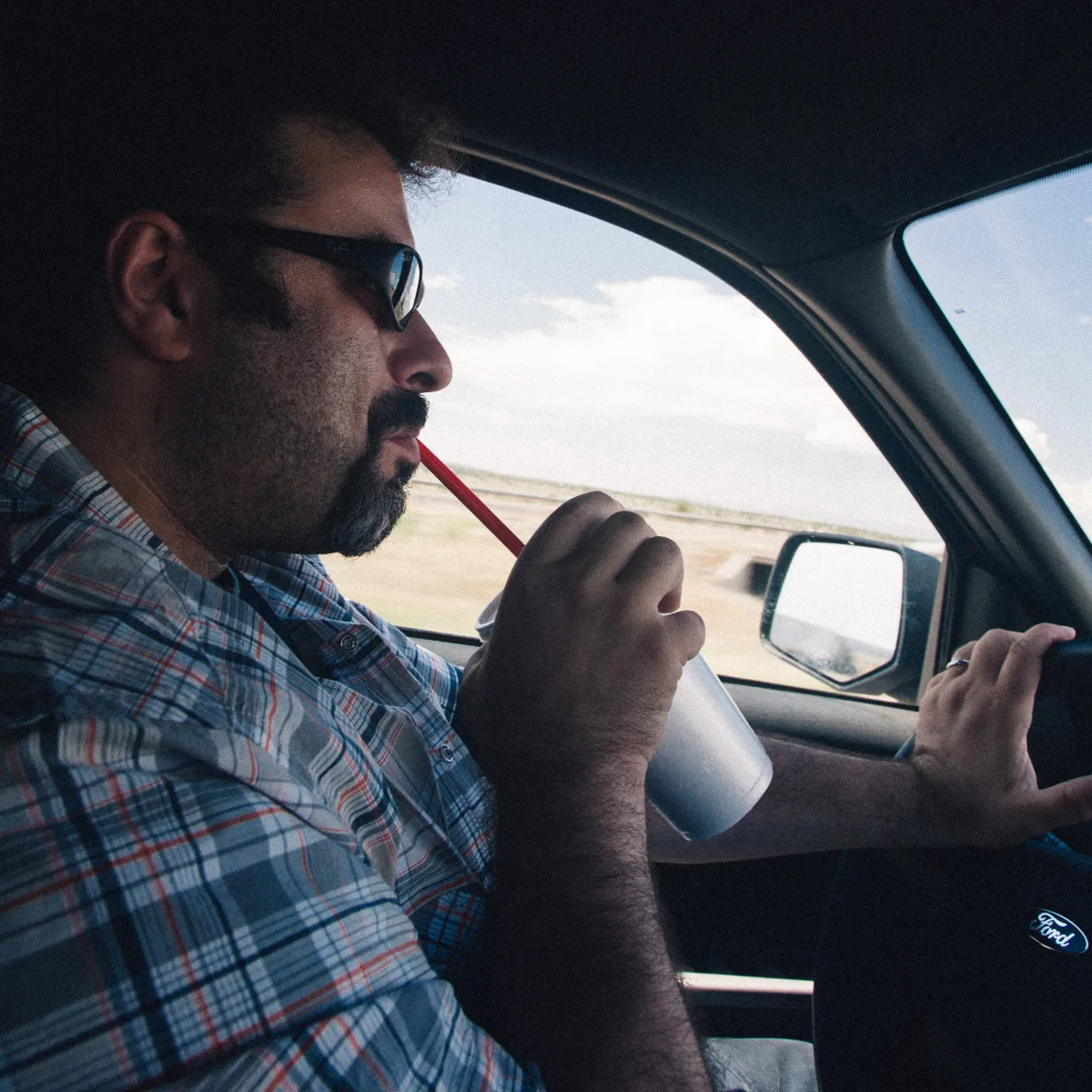 Sipping a milkshake behind the wheel