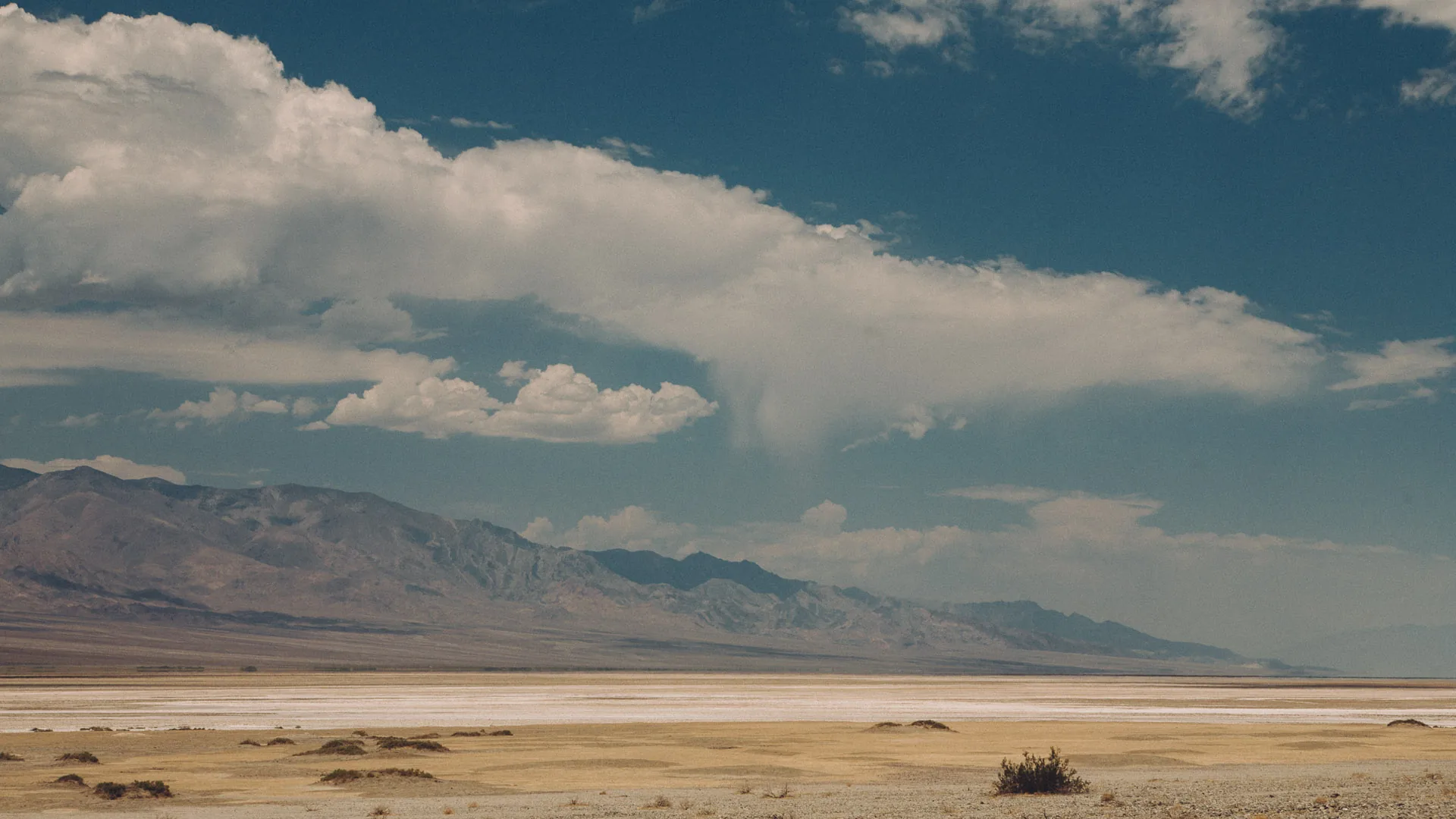 Clouds over the Panamint Range and the pale valley floor