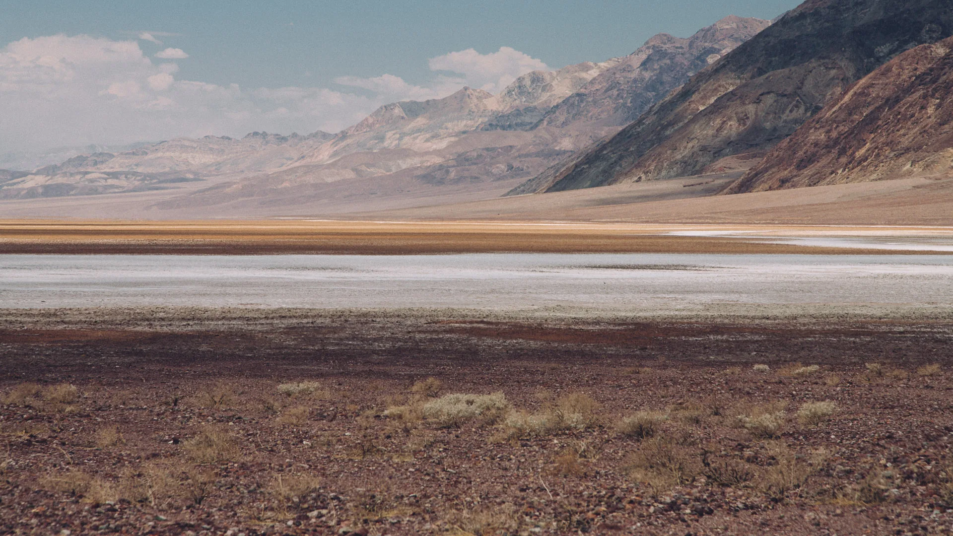 The salt flats glimmering below the Black Mountains