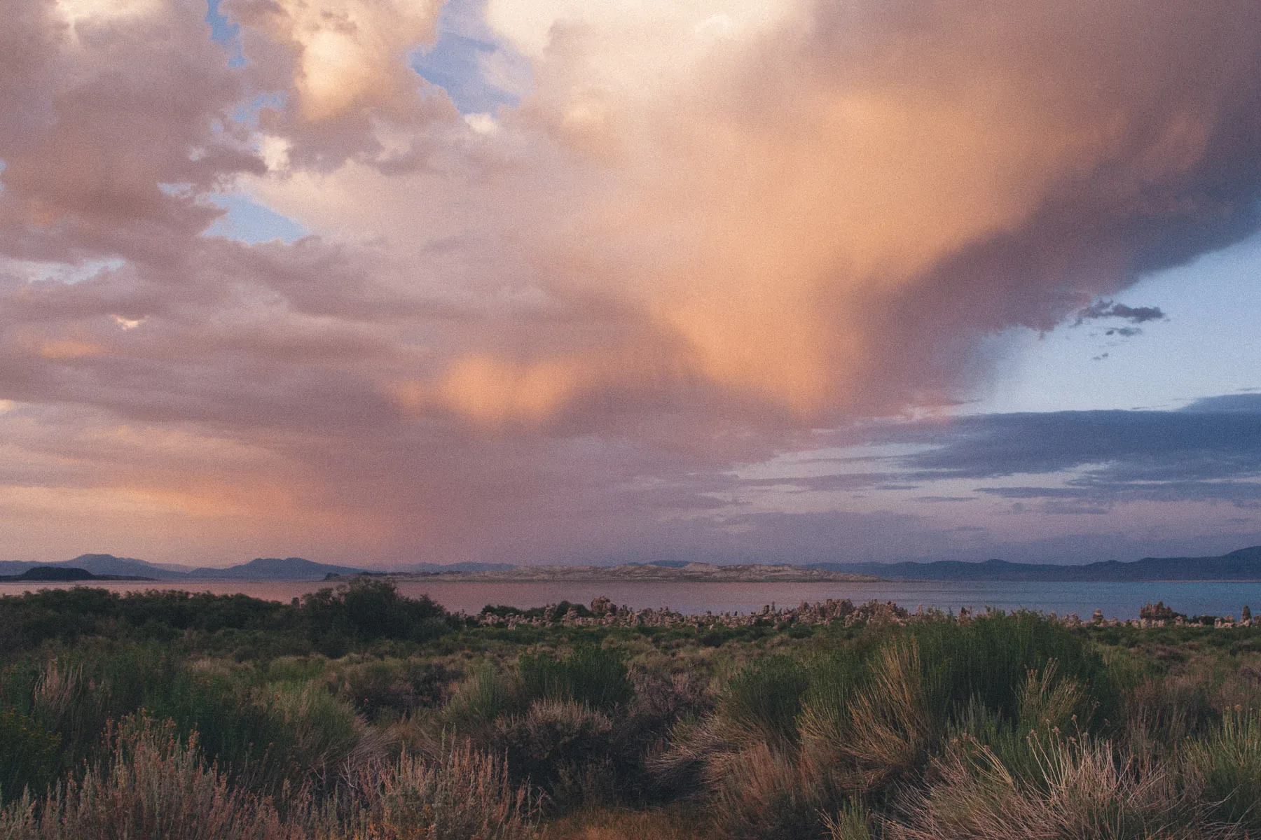 Pink storm clouds over Mono Lake at sunset