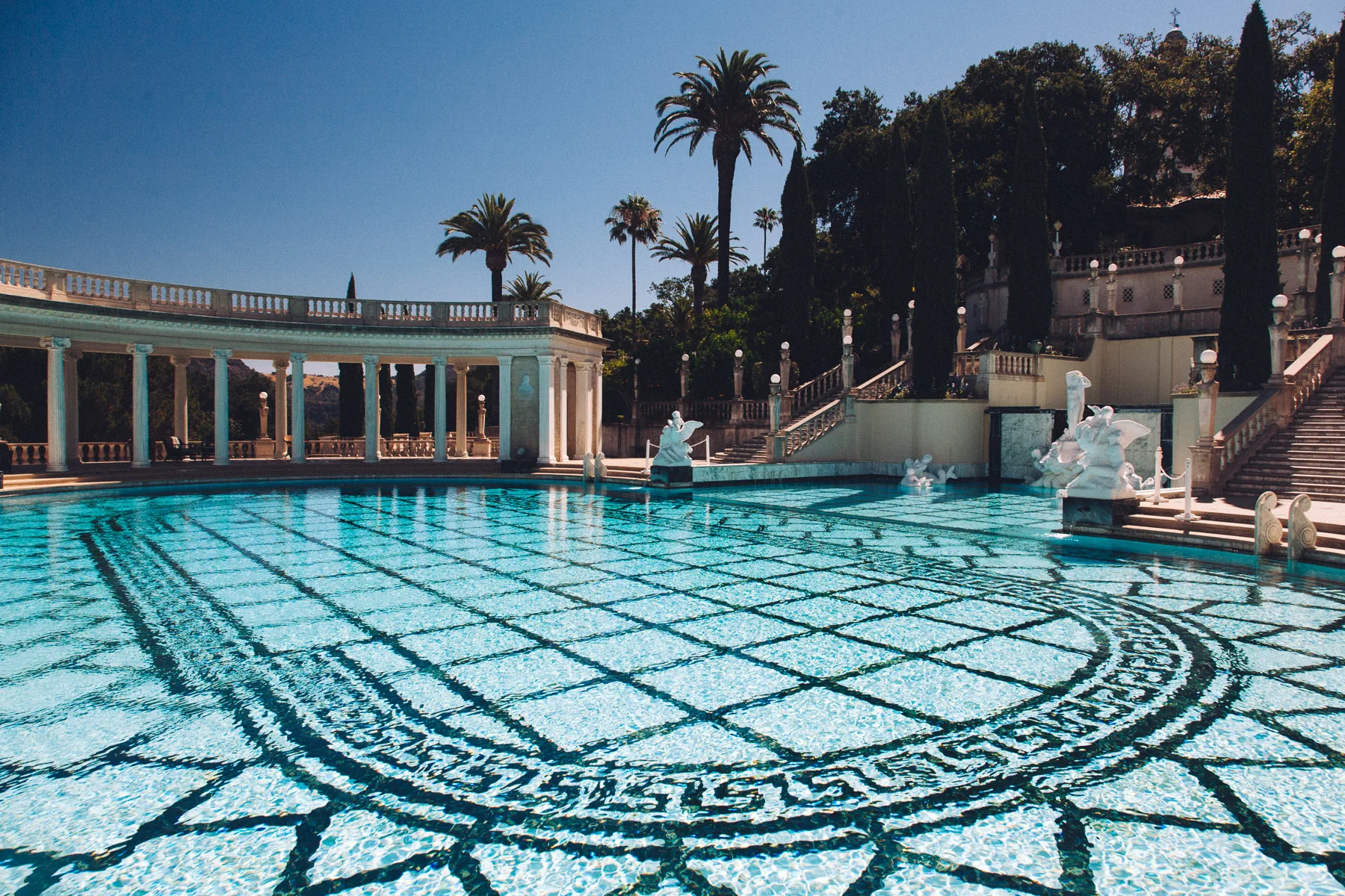 The Neptune Pool at Hearst Castle with its colonnades and palms
