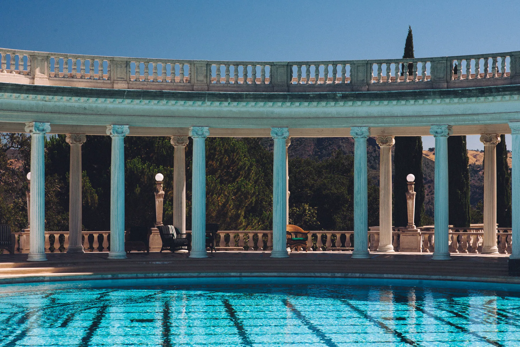 The colonnade reflected in the Neptune Pool