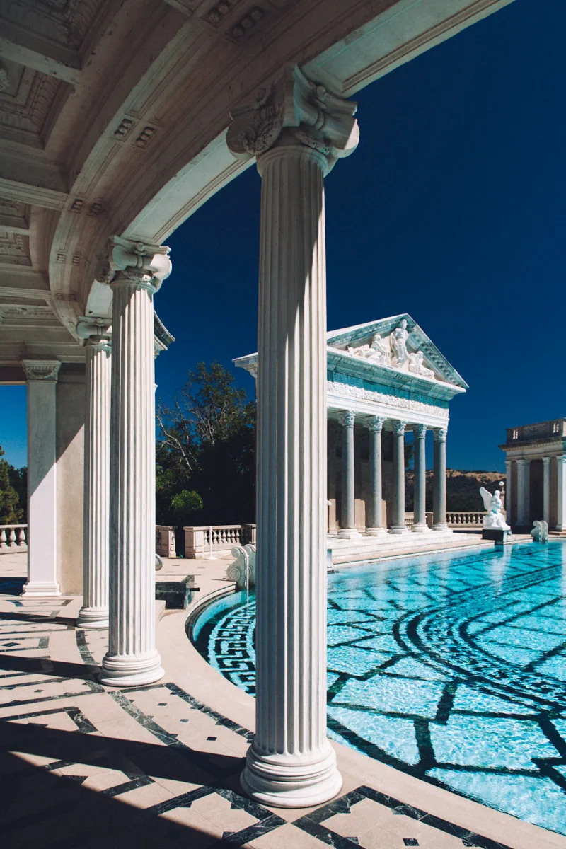 A column framing the Neptune Pool and its temple facade