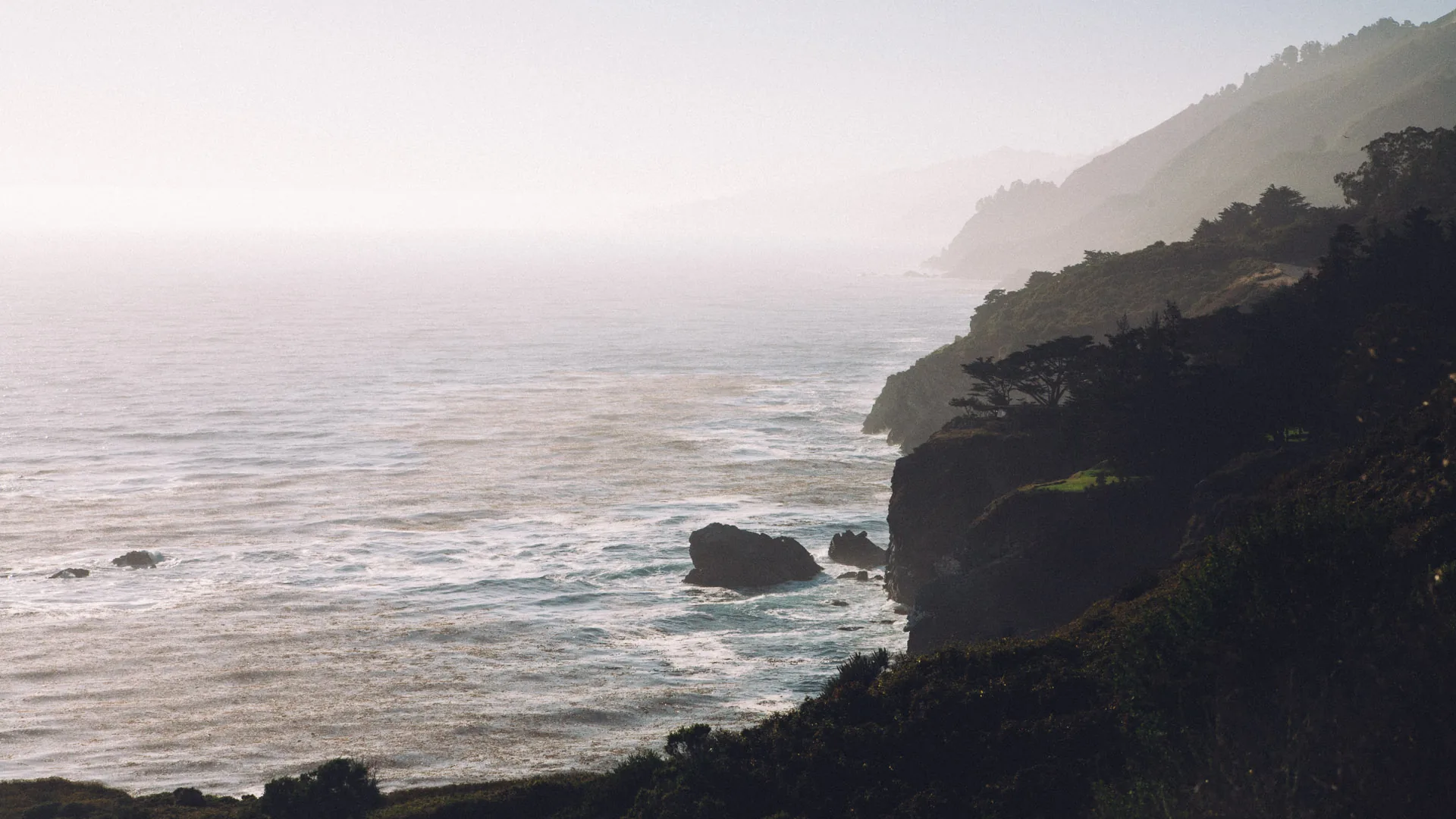 The coastline fading into the afternoon haze