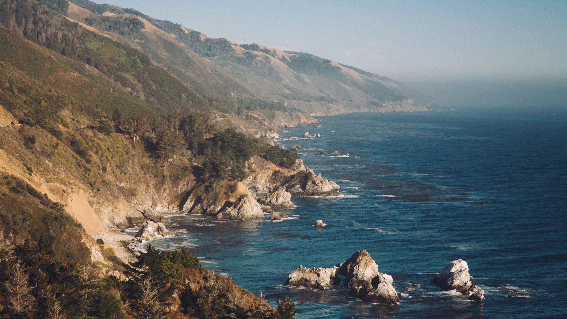 The coast of Big Sur winding south past rocky islets