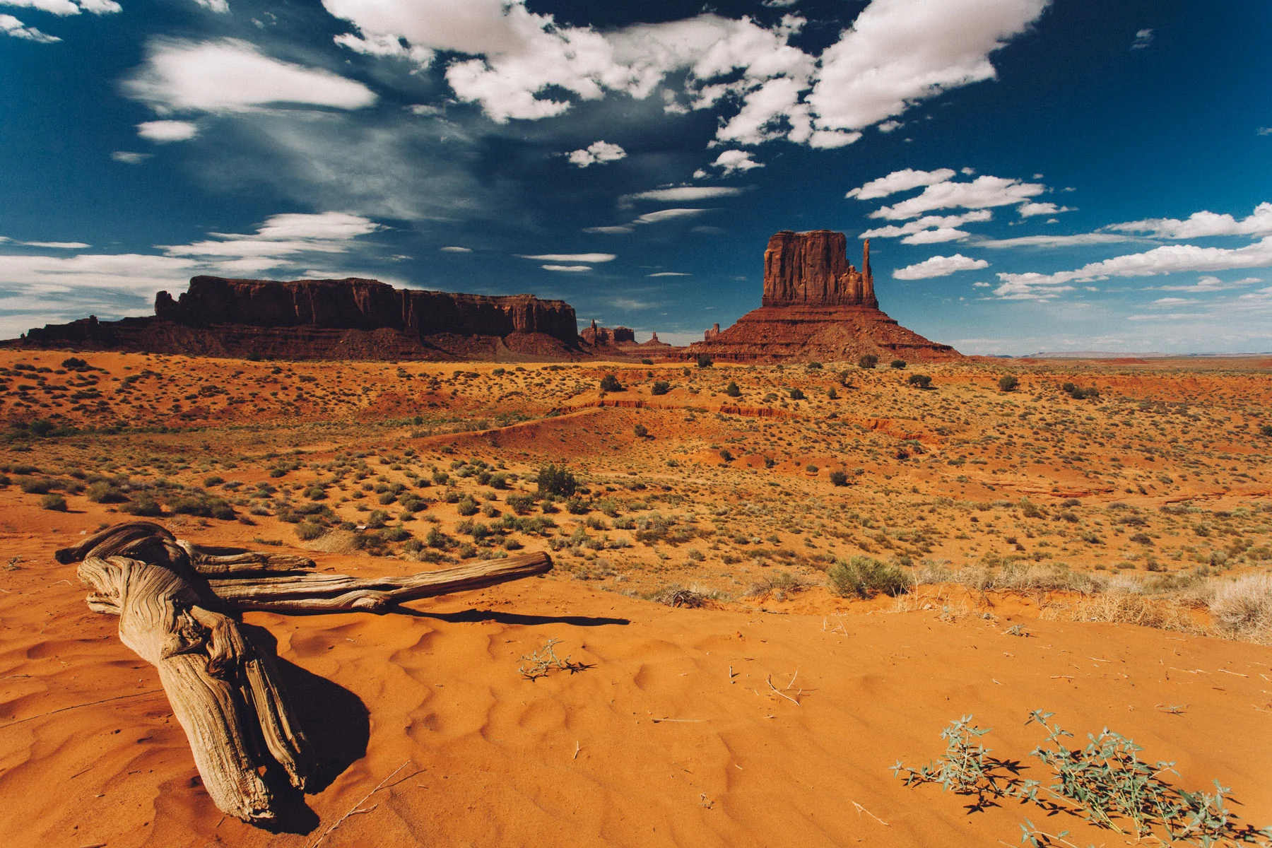 Buttes under a cloud-filled sky