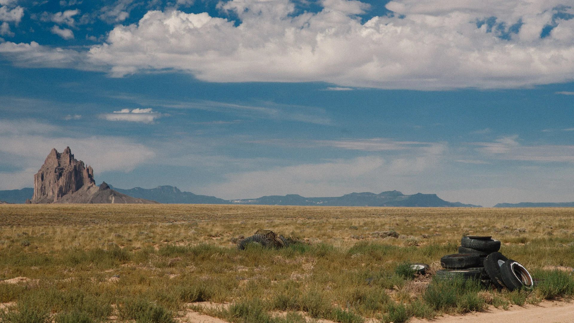 Shiprock rising above the high-desert plain