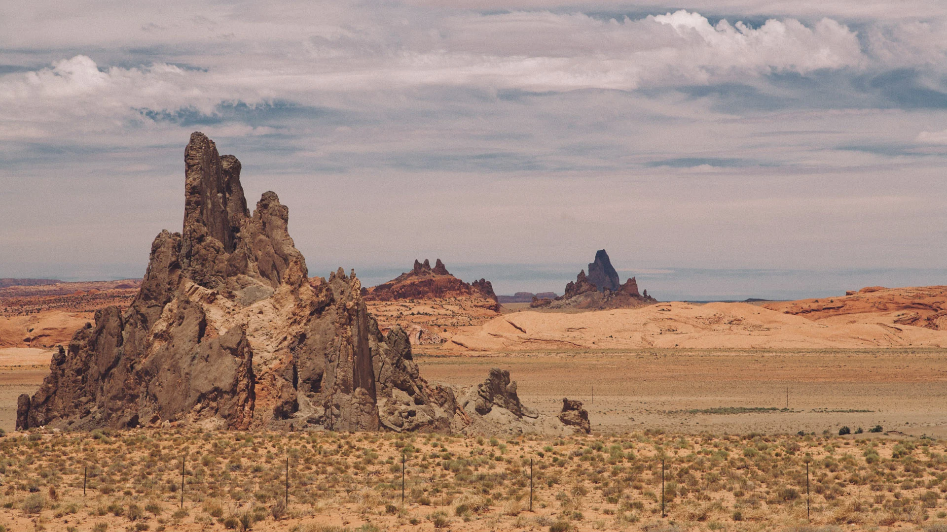 Jagged volcanic rock spires rising from the desert