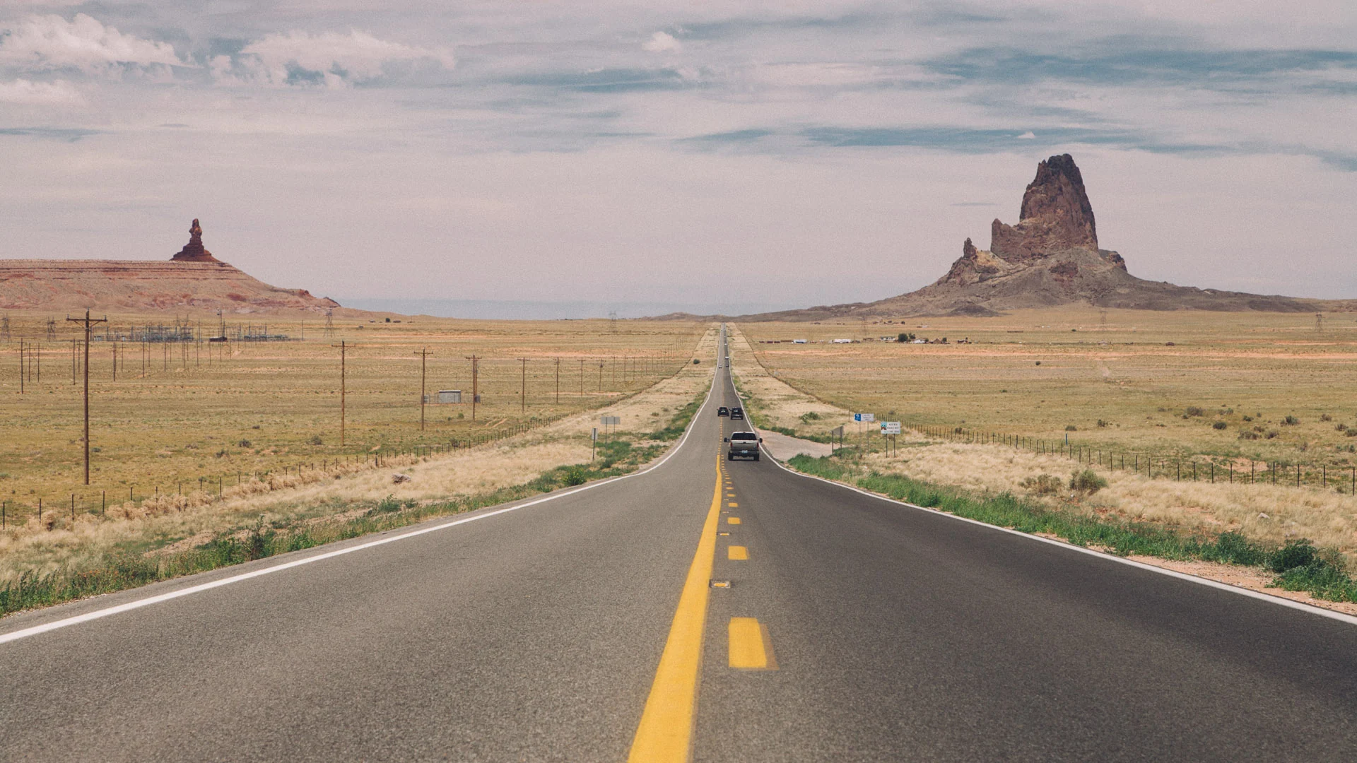 The road to Monument Valley with buttes on the horizon