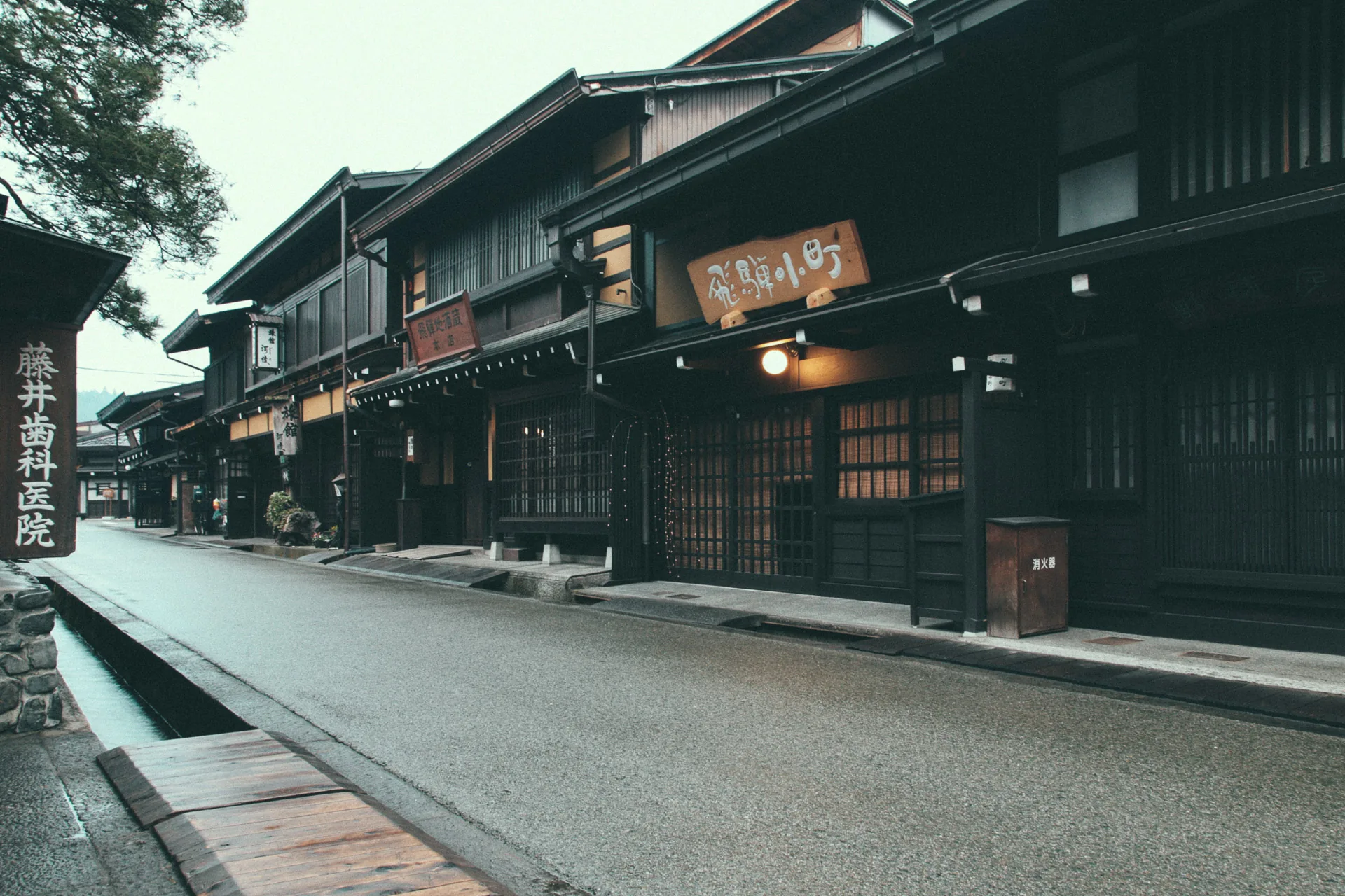The old merchant houses of Takayama on a quiet, wet morning