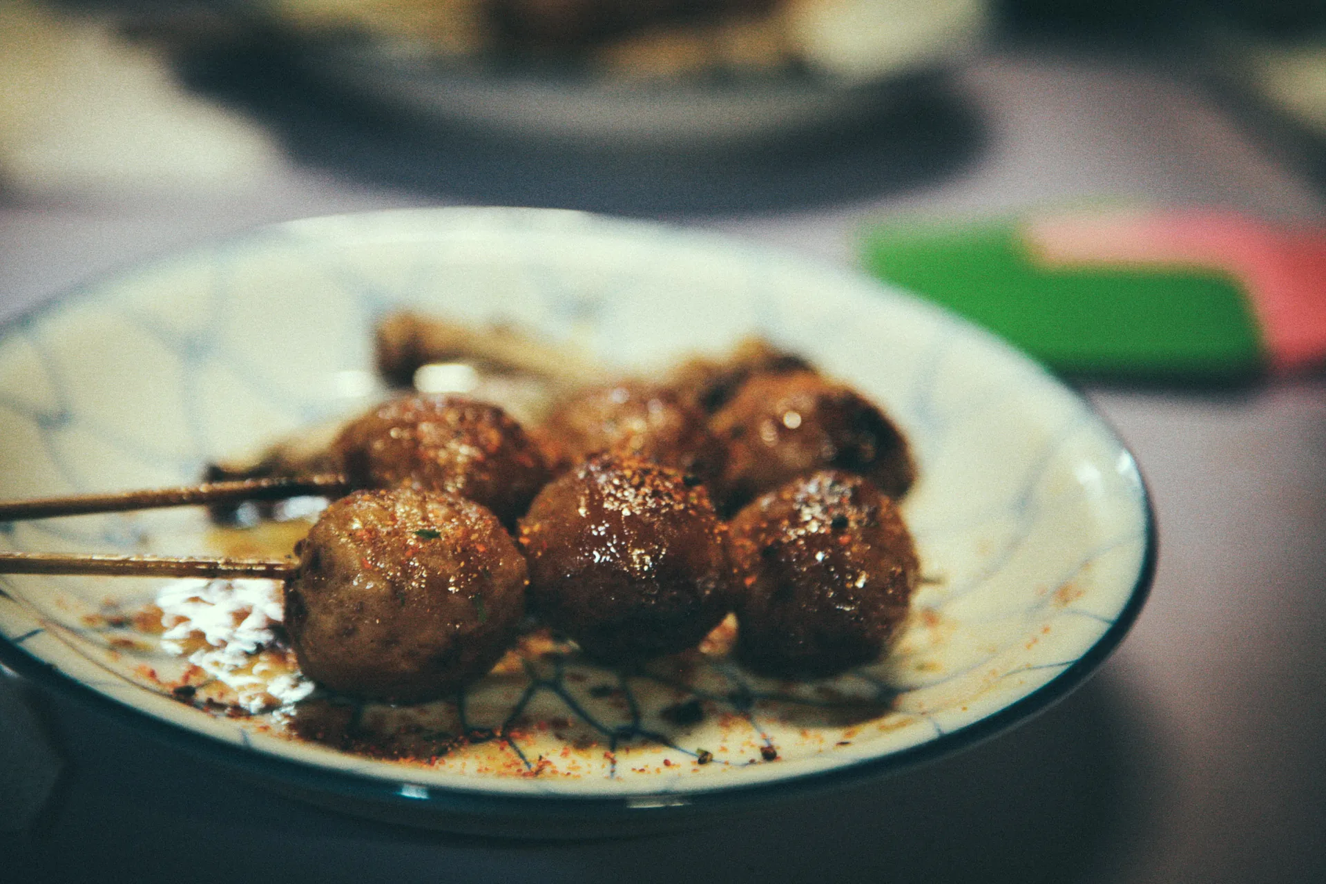 Glazed meatballs on skewers