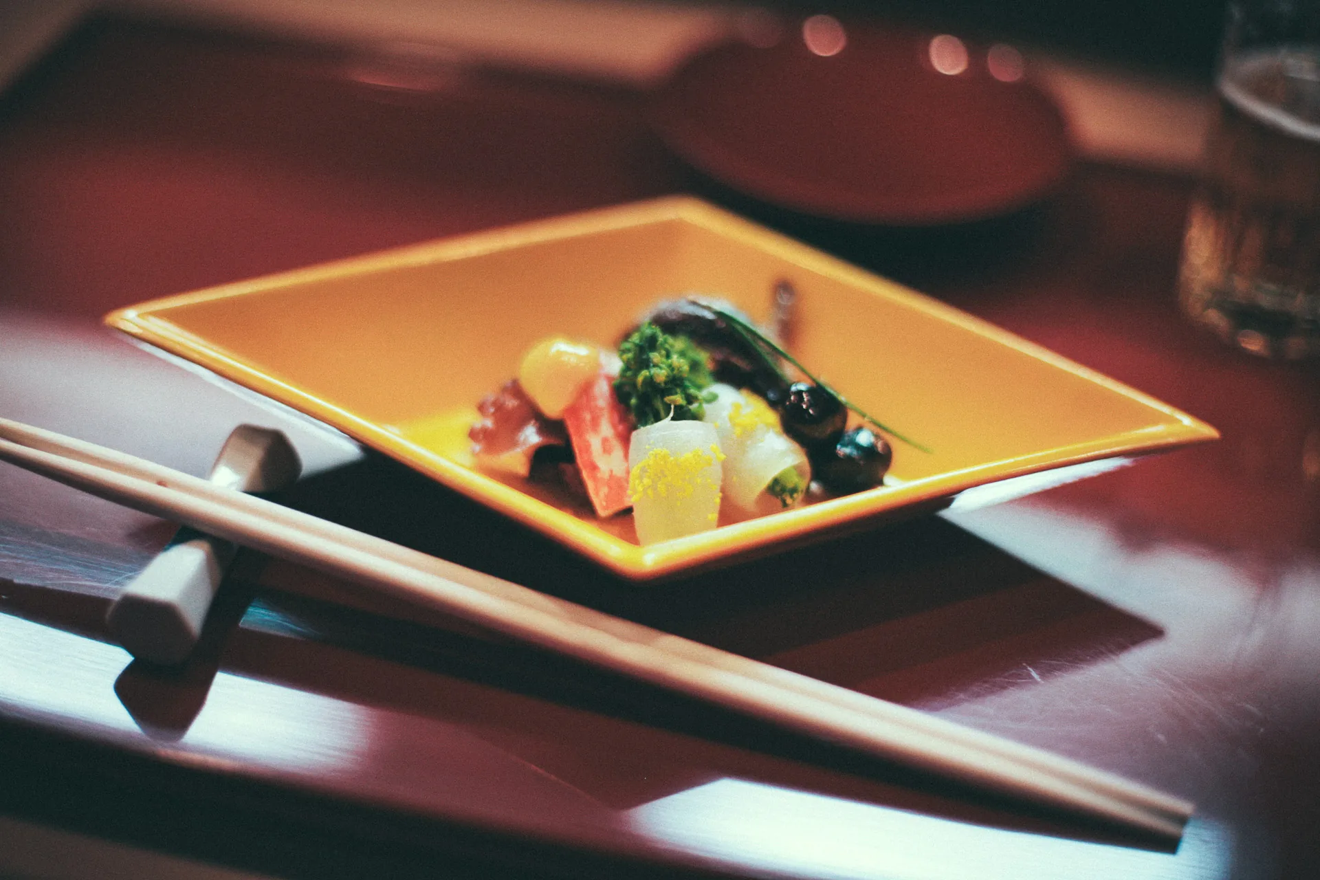 An appetizer on a yellow plate