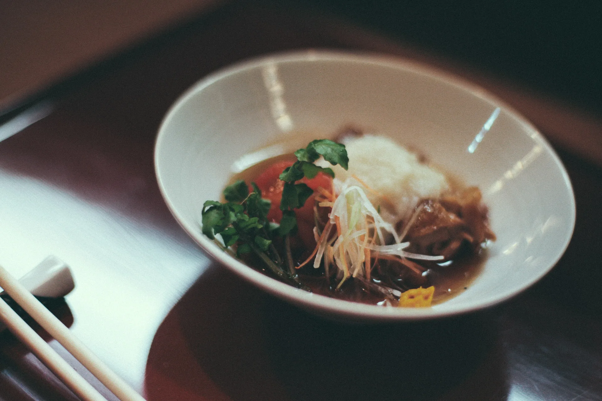 A bowl of simmered fish with grated daikon