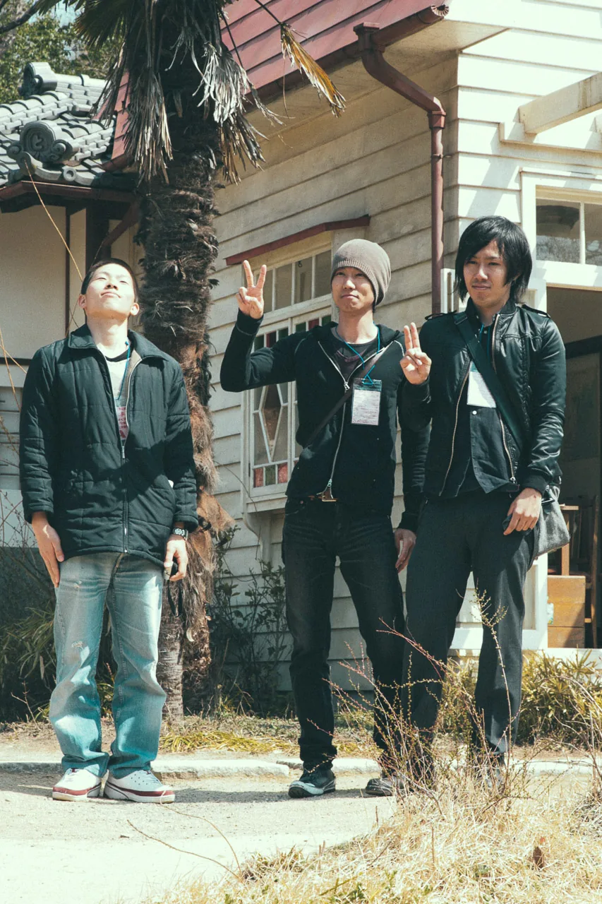 Posing in front of the house