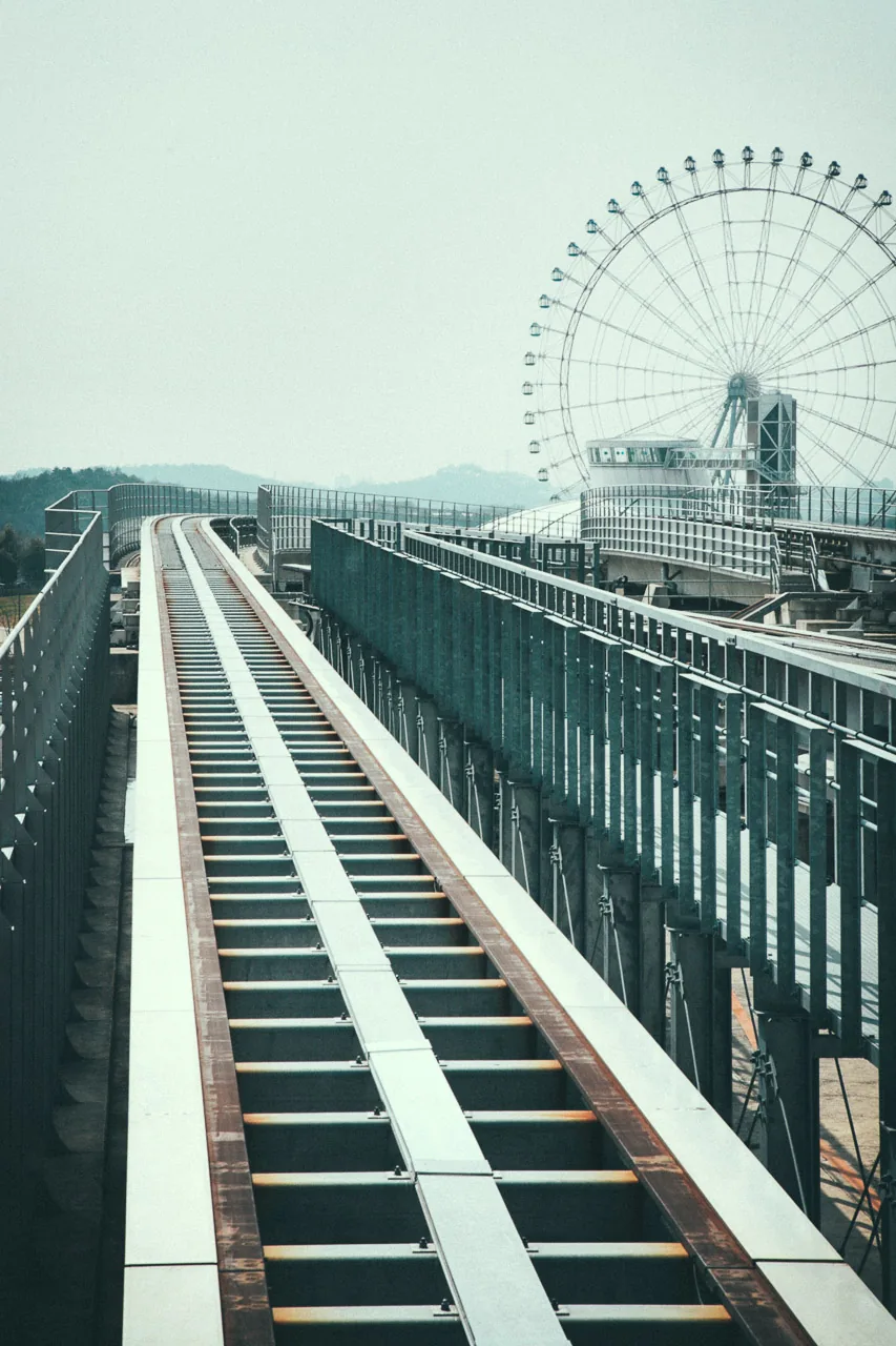 The elevated track toward a Ferris wheel