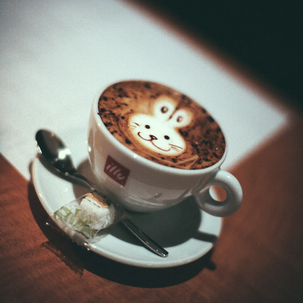 A cappuccino with a rabbit in the foam