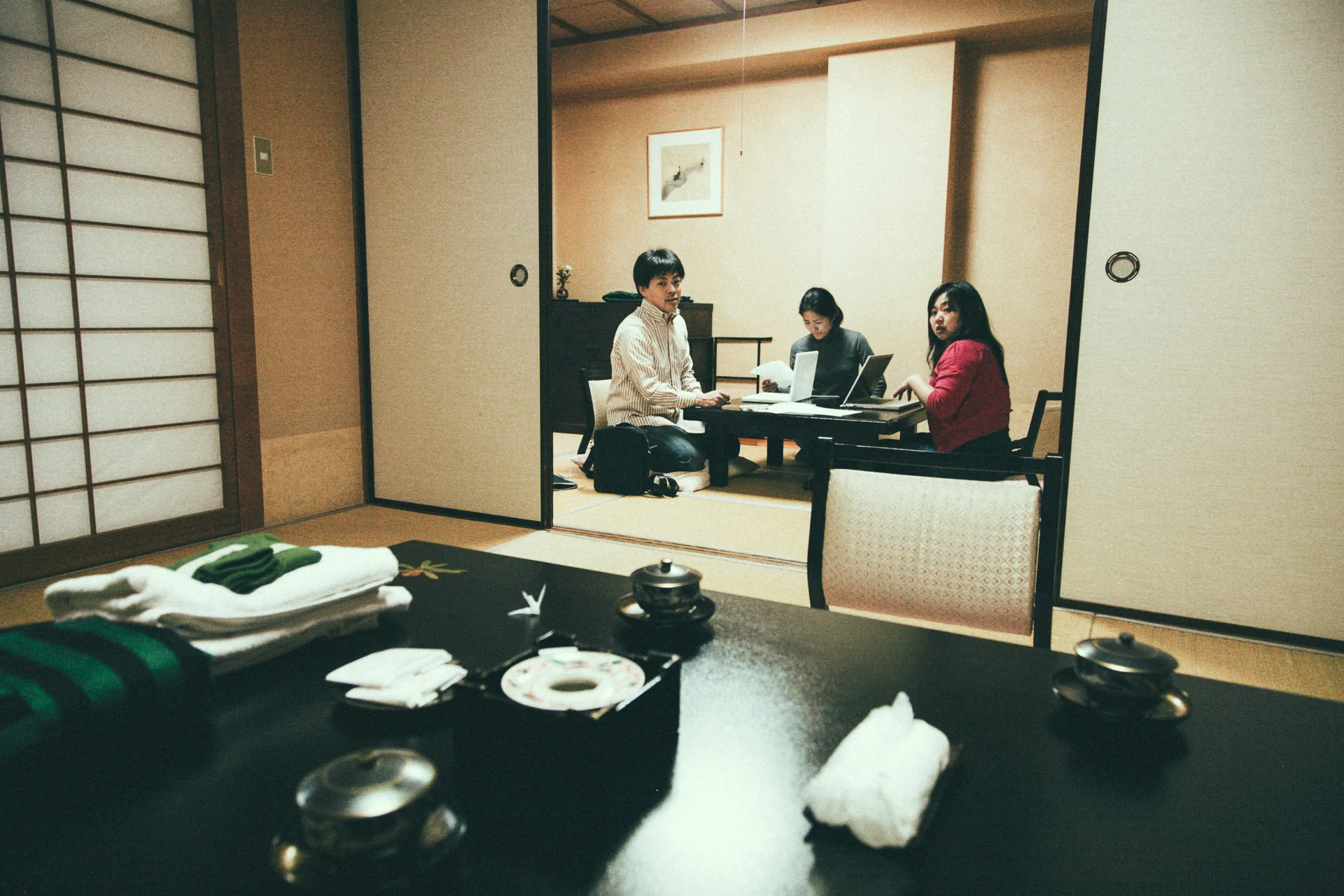 Family at the low table in the room