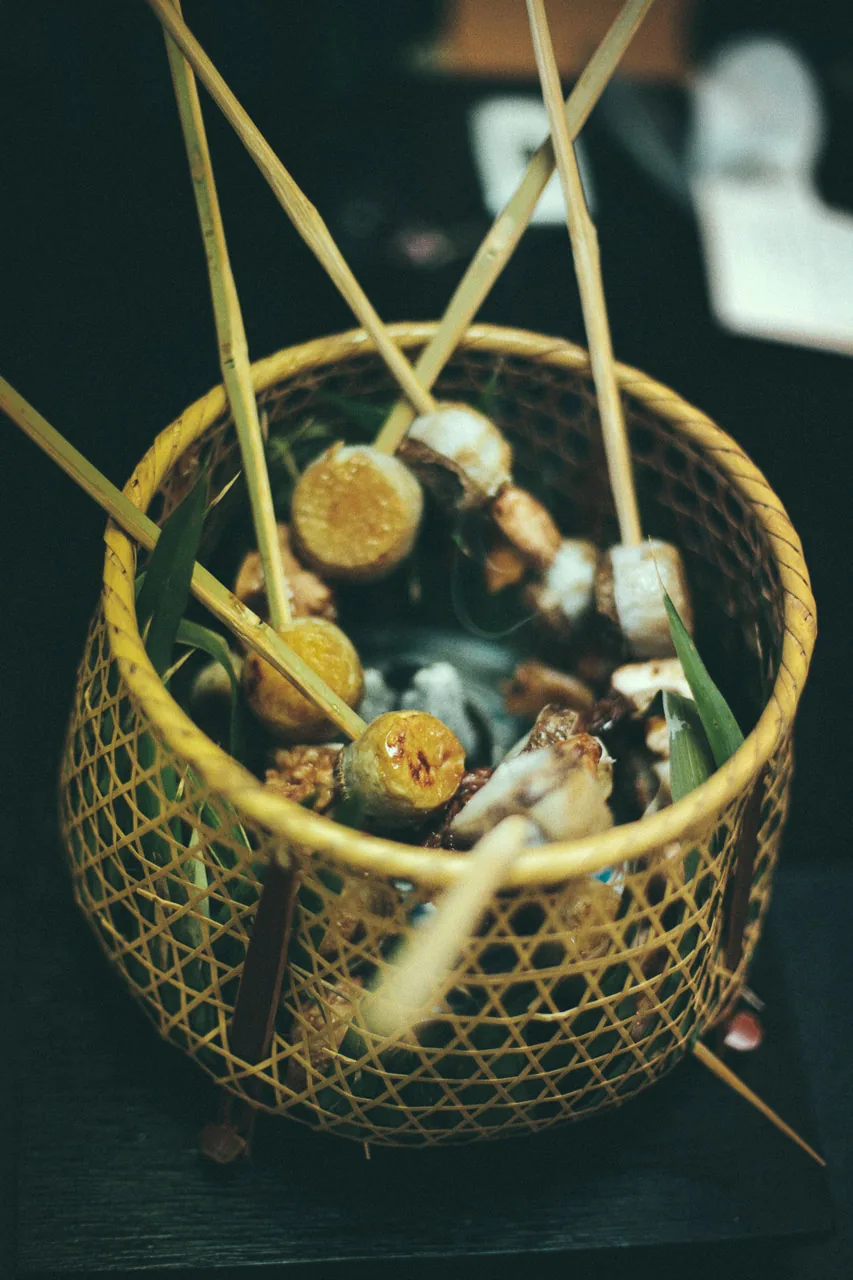 Skewers in a bamboo basket