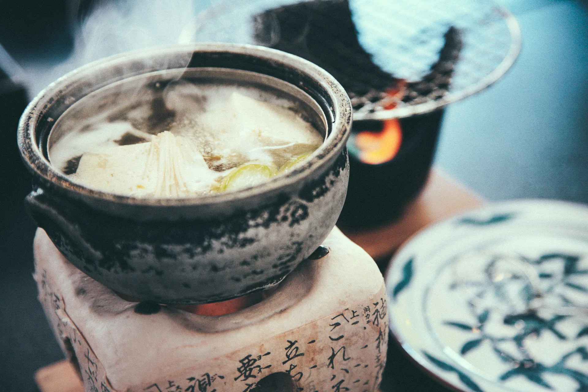 Simmering tofu in the clay pot