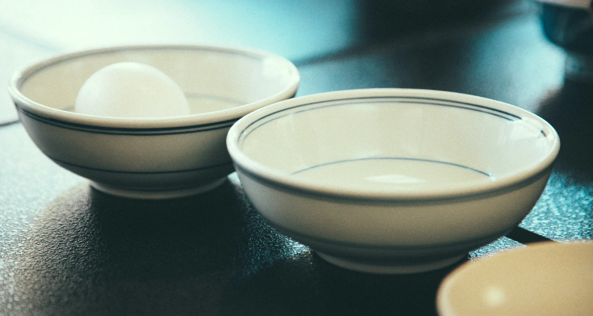 Rice bowls with a raw egg