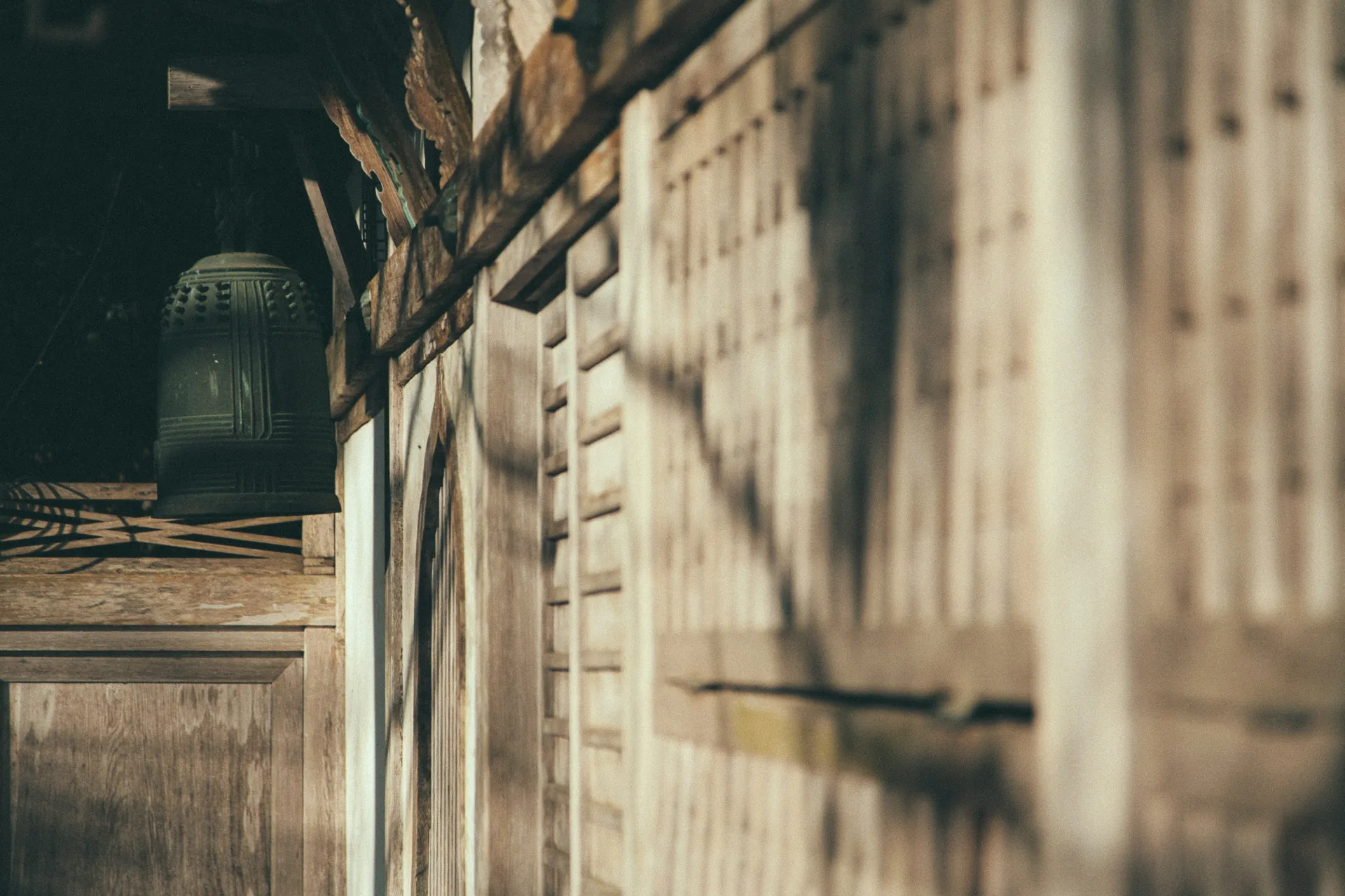 The temple bell in the shadows