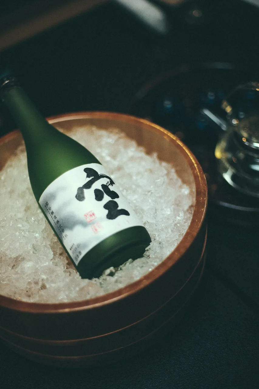 A bottle of sake on ice