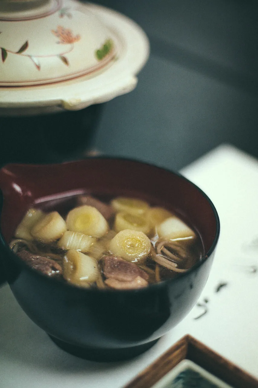 Miso soup in a red bowl