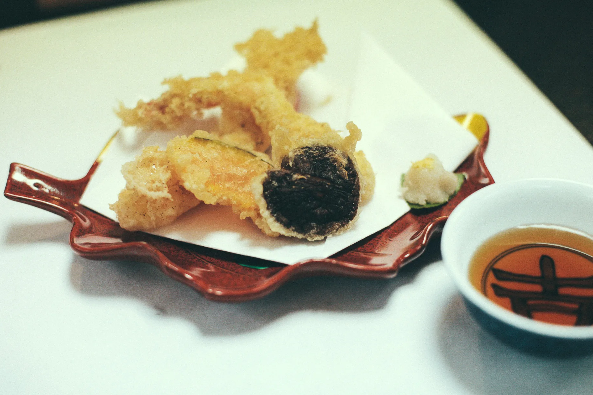 Tempura on a red leaf-shaped plate