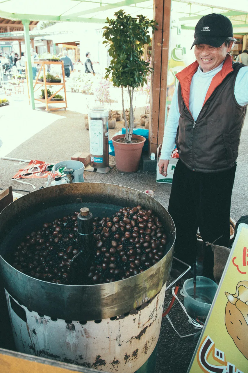 A vendor roasting chestnuts
