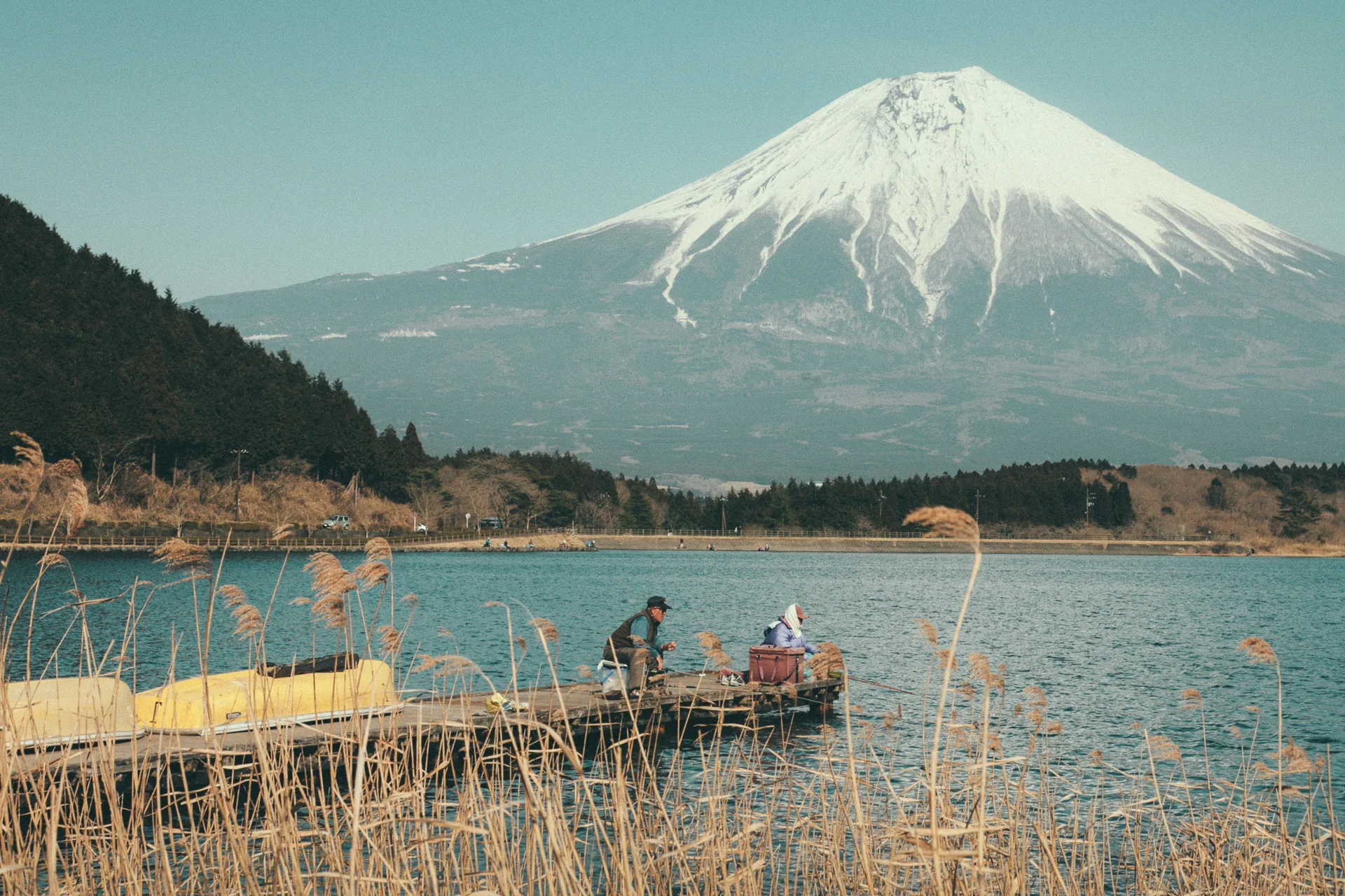 Mount Fuji above Lake Tanuki and its wooden pier