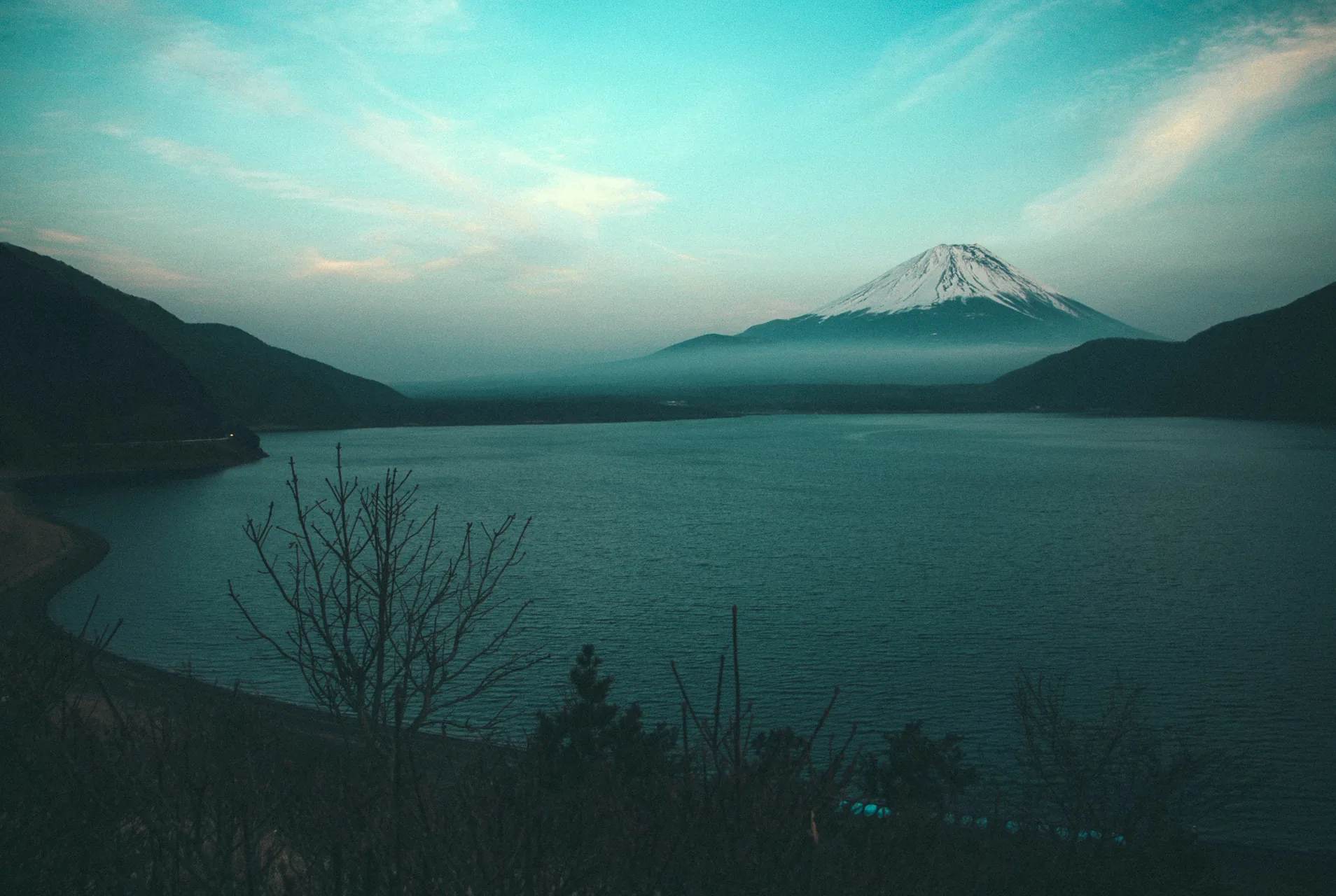 Mount Fuji above Lake Motosu at dusk