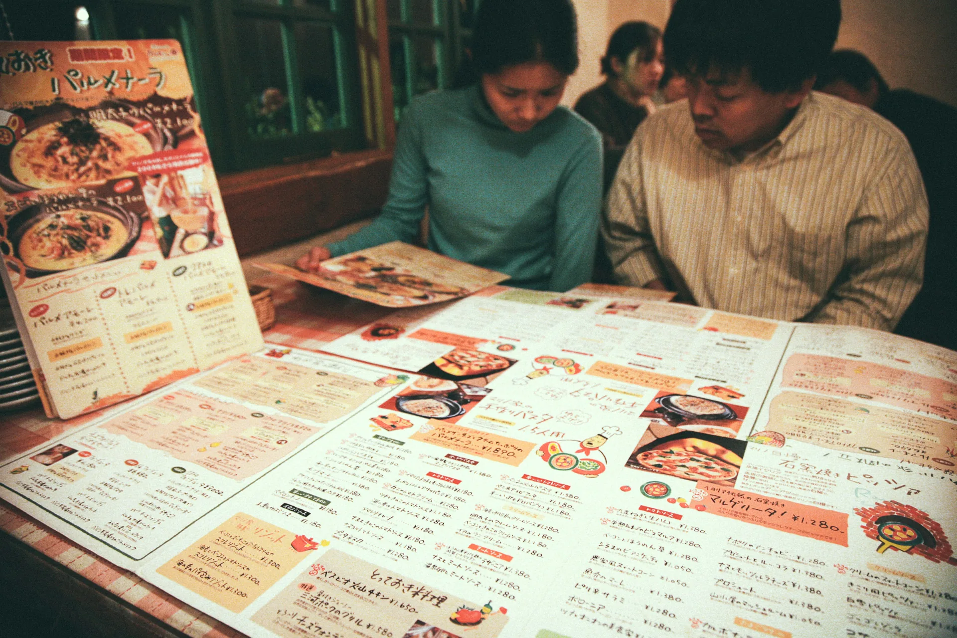 Reading the menu at Pizzeria Marino