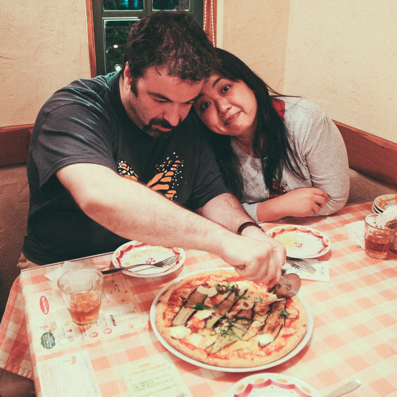 Sharing a slice of pizza