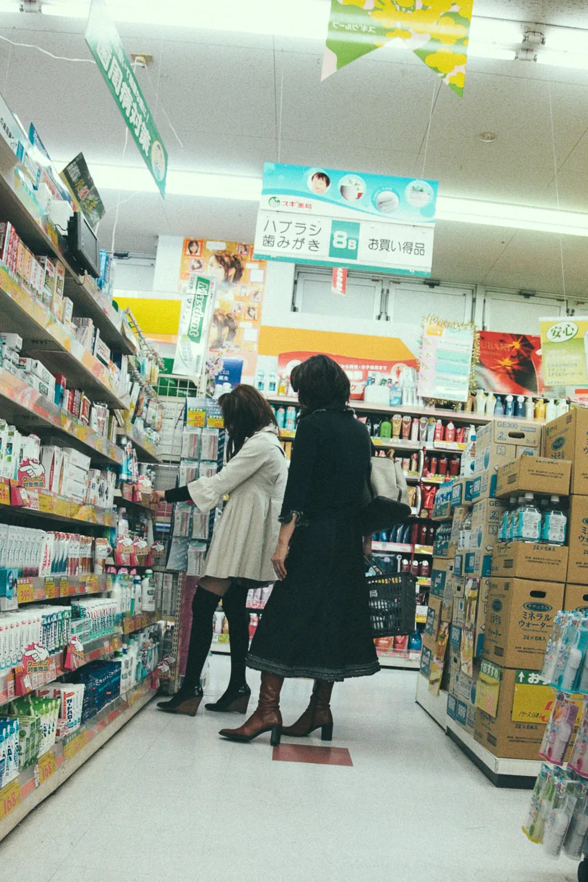 Shoppers in the drugstore aisle