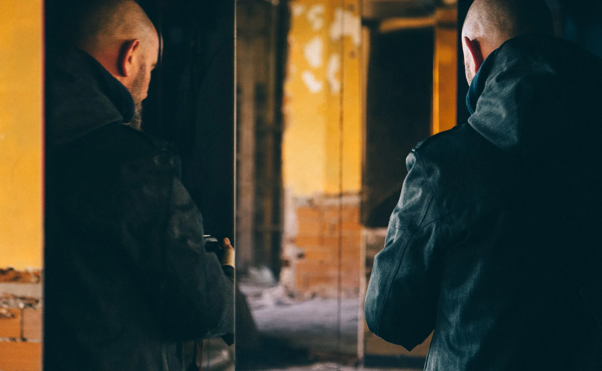 Two friends with cameras inside the abandoned club